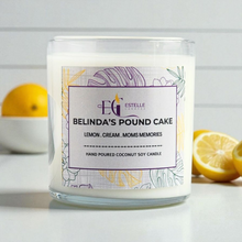 Load image into Gallery viewer, Candle jar with a label on a white surface with lemons. Cream, lemon pound cake