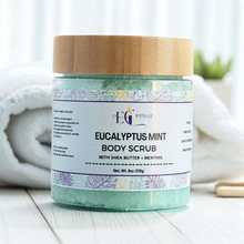 Load image into Gallery viewer, Eucalyptus Mint body scrub jar with a wooden lid on a white surface.