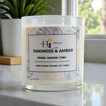 Load image into Gallery viewer, Candle with a label on a surface, featuring the brand 'Estelle Creates'