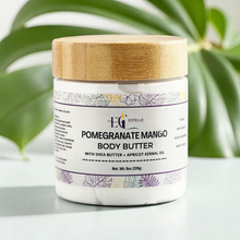 Load image into Gallery viewer, Jar of Pomegranate Mango Body Butter with a wooden lid on a light background. nourishing shea butter, mango butter, apricot kernel oil