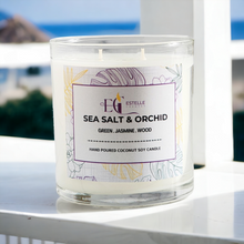 Load image into Gallery viewer, Candle with a label on a white surface with a blurred background