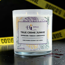 Load image into Gallery viewer, true crime junkie candle decorative elements on a dark background.
Peppercorn, tobacco, sandalwood 
