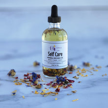 Load image into Gallery viewer, Herbal infused hair &amp; body oil in a glass dropper bottle